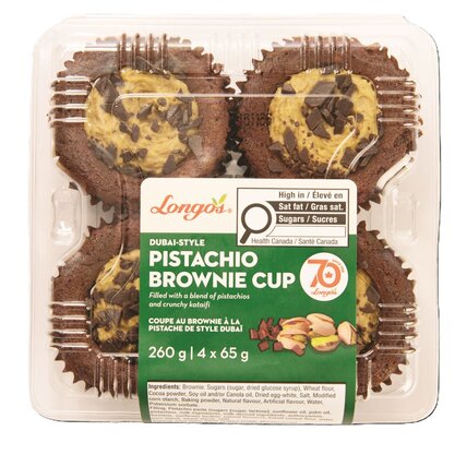Longo’s Dubai-Style Pistachio Brownie Cups in plastic packaging, topped with pistachio cream and chocolate pieces.